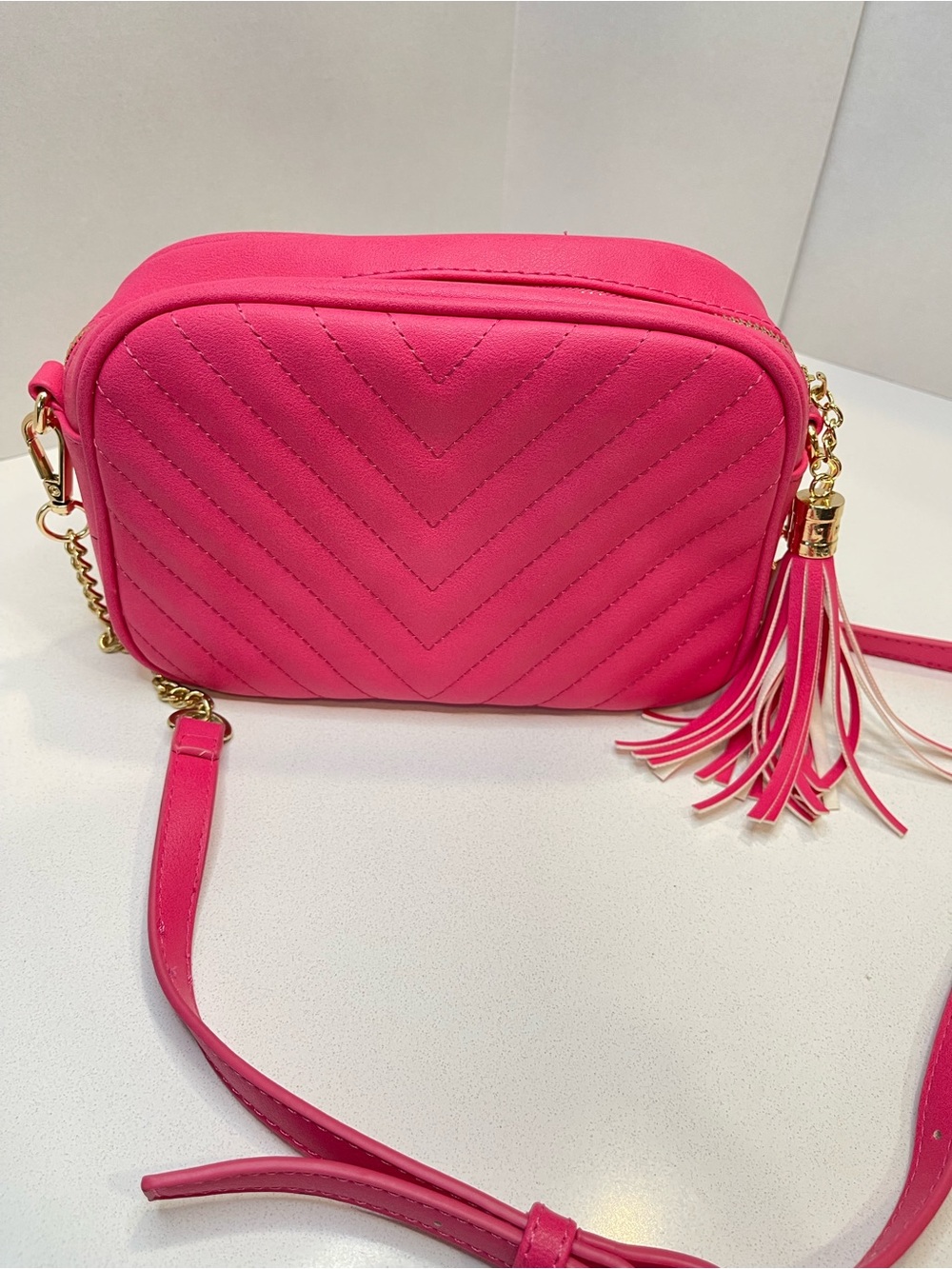 Quilted Pink Crossbody Bag with Tassel Accent